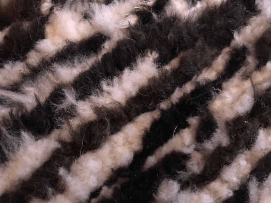 Rug / chair throw, woven, dark