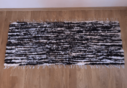 Rug / chair throw, woven, dark